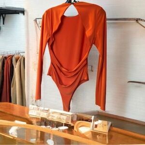Open-Back Long-Sleeve Bodysuit in Burnt Orange